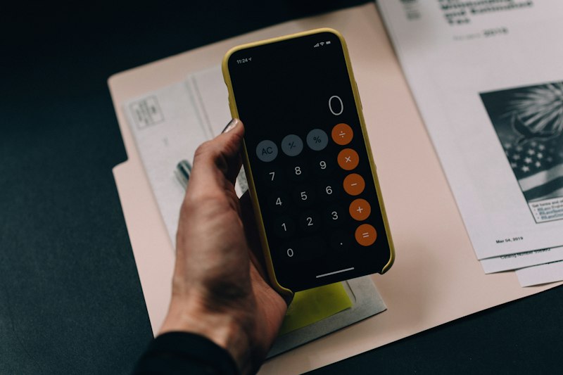Corporate accounting ledger, tax calculations and financial documents